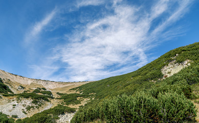 Fototapeta na wymiar Beautiful cloudscape near Bezbog peak (2649 m) - Pirin National Park, Bulgaria