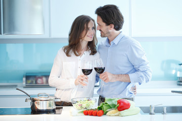 Couple cooking dinner