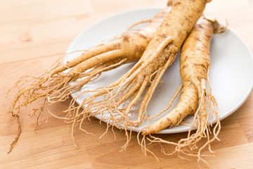 Fresh korean ginseng on plate