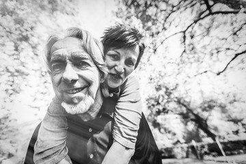 Senior Couple Piggyback Riding