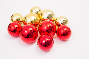 Red and gold Christmas ball on white background