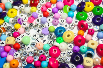 Beads Background. Retro Top View Colorful Bead Heap. child background.