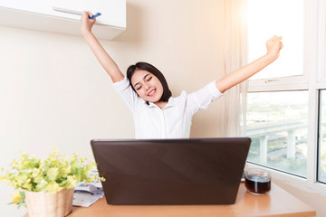 Happy and successful businesswoman pick up her arms and celebrating. Business exchange market job...