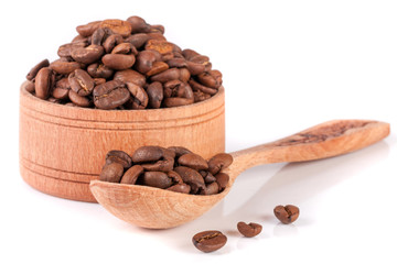coffee beans in a wooden bowl with scoop isolated on white background