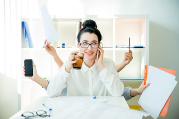 Successful businesswoman multitasking - obrazy, fototapety, plakaty