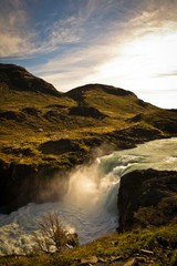 A waterfall in a sunny day at Torres del Paine Park, in Chilean Patagonia