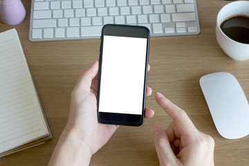 woman hands holding empty screen of smartphone on wood desk work