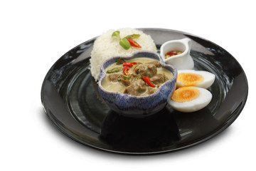 Asian food. Pork Curr Seasoned With Bird Pepper With Rice on isolated  white background