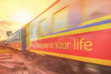 Your way is Your life / Your way is Your life. Motivational quote for life on railway carriages with sunlight reflex. Movement.