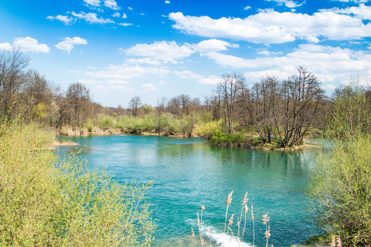 Beautiful landscape, waterfall, clear green water and on Mreznica river in Croatia, panoramic view. 