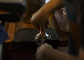 Preparation coffee at the bar from a bartender