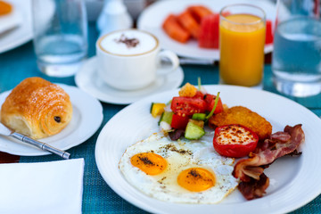 Fototapeta na wymiar Breakfast with fried eggs