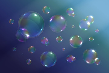 Vector set of isolated realistic soap bubbles on the blue background.
