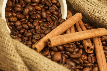 Coffee grain in a  bag with cinnamon.