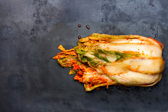 Korean  style salted cabbage Kimchi on grill tray