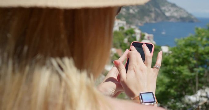 Tourist Woman holding smartphone in Italy texting Girl sharing lifestyle photo using mobile phone enjoying  summer holiday European vacation travel adventure