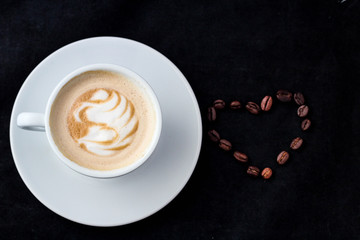 Cup of espresso and cappuccino and coffee beans for menu and background with love