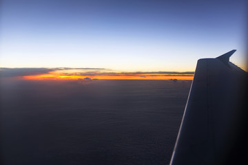 Sunset or sunrise from airplane