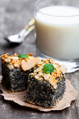 Poppy  seed pie freshly baked with fresh milk on wooden background