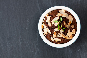 Delicious  homemade chocolate muffin cake in small pot. Top view.