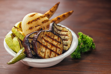 grilled vegetables on wooden table, close up