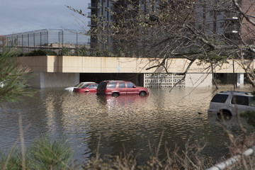 NEW YORK - November 1: Flooding in the parking lot  in Far Rockaway after hurricane Sandy  October...