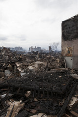 Homes sit smoldering after Hurricane Sandy on October 30; 2012 in the Far Rockaway area . Over 50 homes were reportedly destroyed in a fire during the storm on October 30; 2012 in New York City; NY
