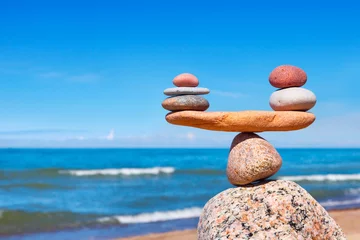 Foto auf Leinwand Concept of harmony and balance. Balance stones against the sea. © Aleksandr Simonov