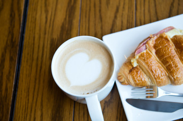 Breakfast with bread and coffee.
