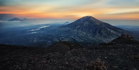 Tuinposter Merbabu volcano in Java viewed from Merapi © Stockbym