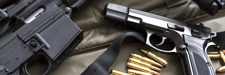 Assault rifle with handgun and ammunition. Military weapon