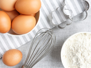 Chicken rind eggs, flour, ingredients and props shape and corolla for cooking homemade baking flat lay