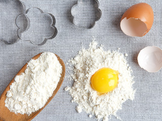 Chicken rind eggs, flour, ingredients and props shape and corolla for cooking homemade baking flat lay