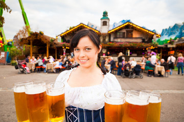 Young German Woman Serving Beer