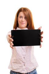 Beautiful smiling girl holding a tablet