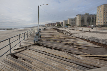 Fototapeta premium NEW YORK - November 1: Large section of the iconic boardwalk was washed away during Hurricane Sandy in Far Rockaway area October 29, 2012 in New York City, NY