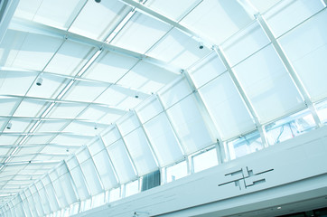 the metal and glass roof of a mall