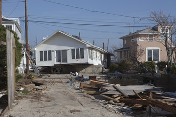 Fototapeta na wymiar NEW YORK -November12:Destroyed homes during Hurricane Sandy in the flooded neighborhood at Breezy Point in Far Rockaway area on November12, 2012 in New York City, NY