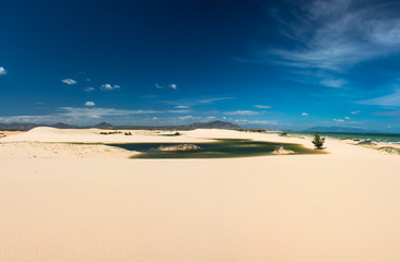 desert, blue sky and lake in Vietnam panorama