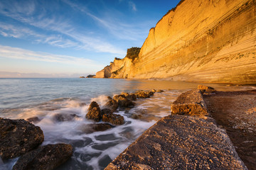 Logas the Sunset Beach and amazing rocky cliff in Peroulades. Corfu Island. Greece.