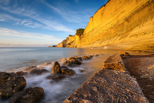 Logas the Sunset Beach and amazing rocky cliff in Peroulades. Corfu Island. Greece.
