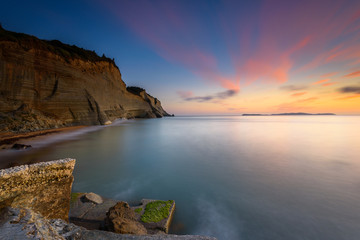 Logas the Sunset Beach and amazing rocky cliff in Peroulades. Corfu Island. Greece.