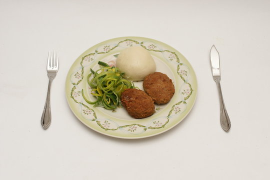 Kotlet z kluską na parze