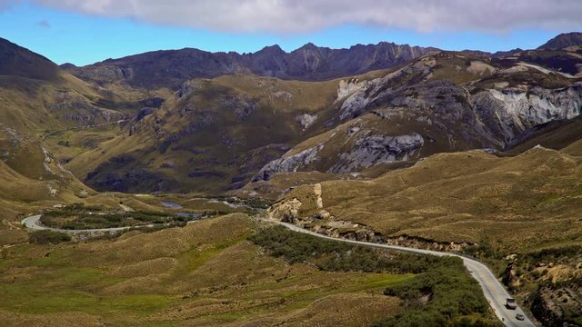 Time lapse of Cars and trucks traveling through the Cajas National Park near Cuenca Ecuador. Sept 9th 2016