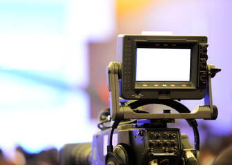 Live broadcasting, television operator with camera.