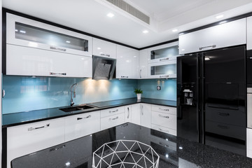 Black and white gloss kitchen