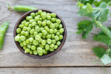 Peeled green peas in a plate