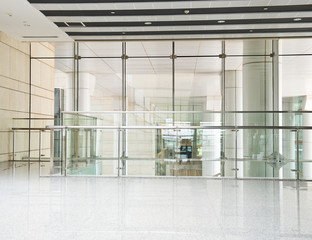 modern interior with glass wall in an office building.