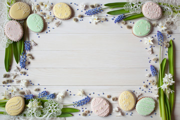 Easter background with flowers hyacinths and cakes in the form of eggs