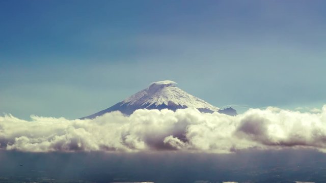 Time lapse Cotopaxi Volcano above the clouds